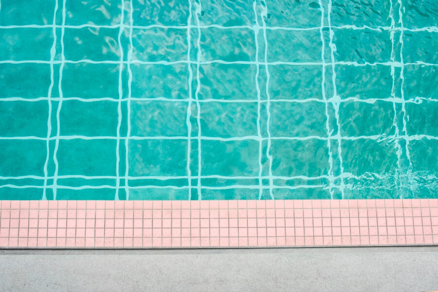 Swimming pool floor tiles